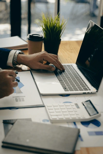 Business People Working On Calculators 600nw 2143453867